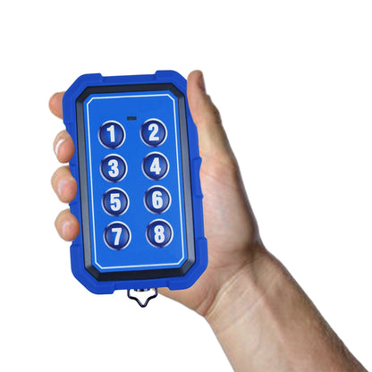 Elsema PentaFOB handheld remote control with anti-slip rubber boot, held in hand